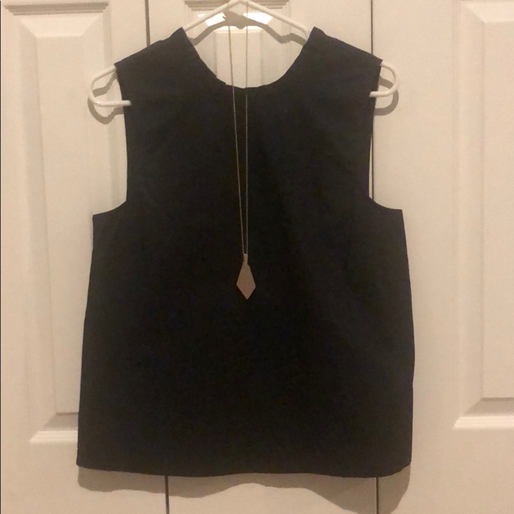 Black sleeveless woven top